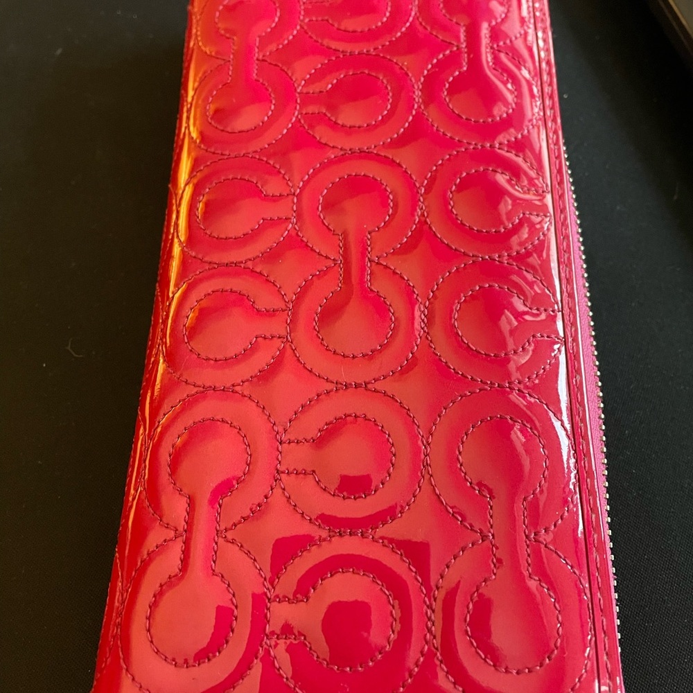 Coach wallet, 12+ card slots, two cash, zippered coin. Pink patent leather!
